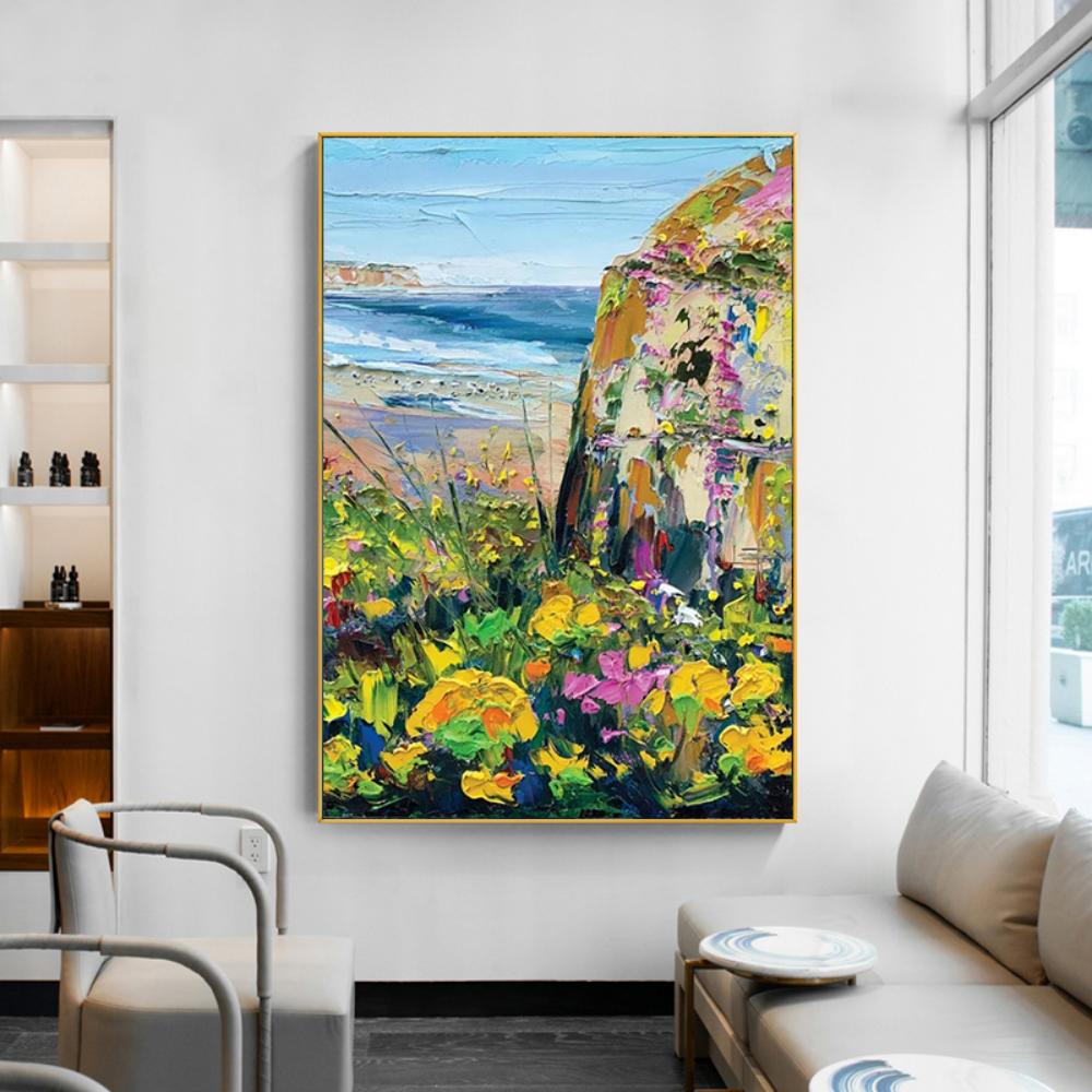 On the coast, there are grass and flowers